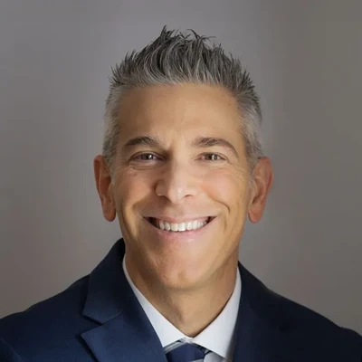 David DeRosa Smiling Warmly For Patients